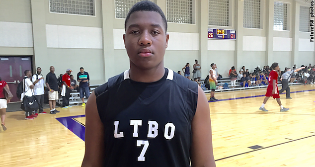 2020 center Marcus Dumervil is a load in the low block.