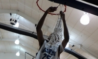 Darius Beane cuts the net following the SIJHSAA Championship